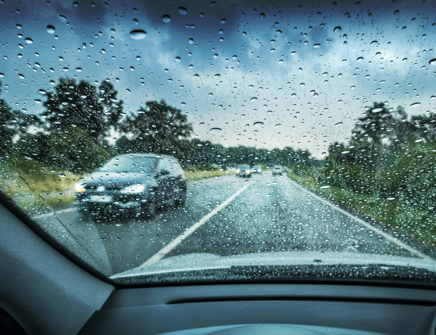 Car driving in the rain